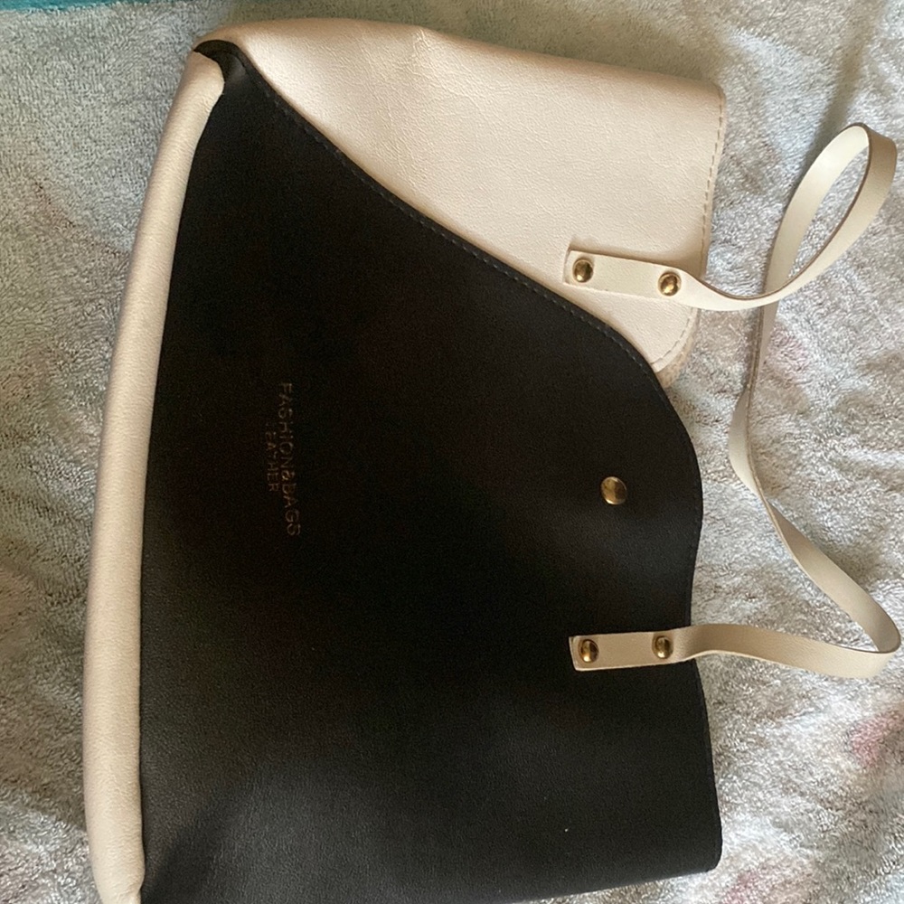 Cute little hand bag that’s black and white from shein